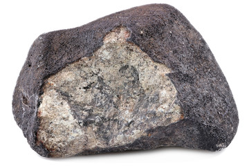 fragment of the Chelyabinsk meteorite (fallen 15 February 2013) isolated on white background