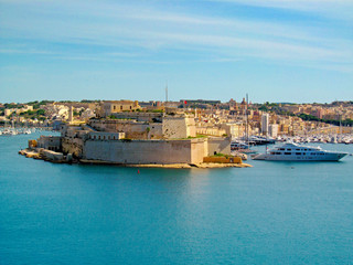 Fototapeta na wymiar The Grand Harbor of Valletta, Malta. Beautiful ancient city is the capital of the Republic of Malta and is a famous tourist destination.