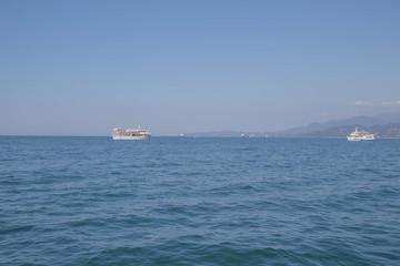 Motor boat in amazing colorful water of Georgia Batumi