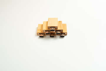 Stack of wooden pendrive memory usb isolated on white background.