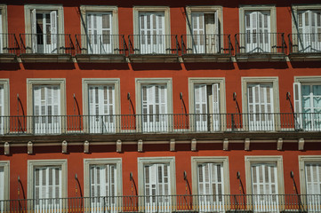 Fototapeta na wymiar Building with colorful facade and windows on the Plaza Mayor in Madrid