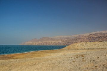 Dead sea Middle East desert and waterfront sand beach scenery landscape health care destination for travelers and tourists