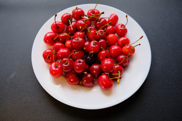 Sweet fragrant sweet cherries for summer breakfast.