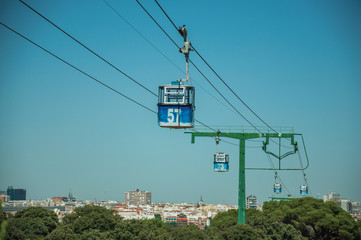 Cable car gondola and big supporting towers at the Teleferico Park of Madrid