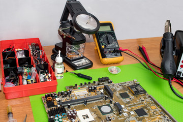 the desk of an electronics engineer, a master of radio equipment, tele, video equipment, complex...