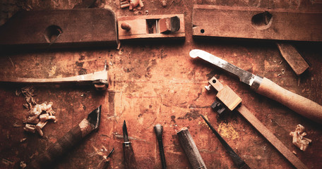Hand tools Wood on an old wooden workbench