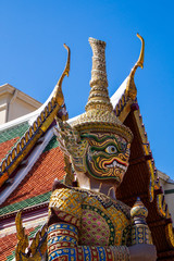 Naklejka premium Demon Guardian at the Wat Phra Kaew - the Temple of the Emerald Buddha is a Buddhist temple in the historic centre of Bangkok, Thailand, within the grounds of the Grand Palace.