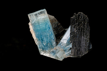 Fototapeta premium Macro stone mineral tourmaline aquamarine with a black background