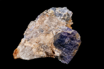 Macro tourmaline mineral stone on black background