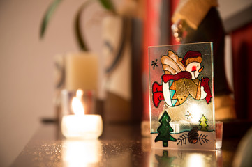 Naklejka na ściany i meble Christmas decoration with candle background.