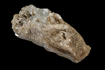 Macro stone Topaz mineral on a black background