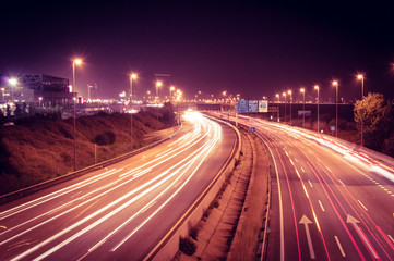 Fototapeta na wymiar Long exposure over a highway at night.