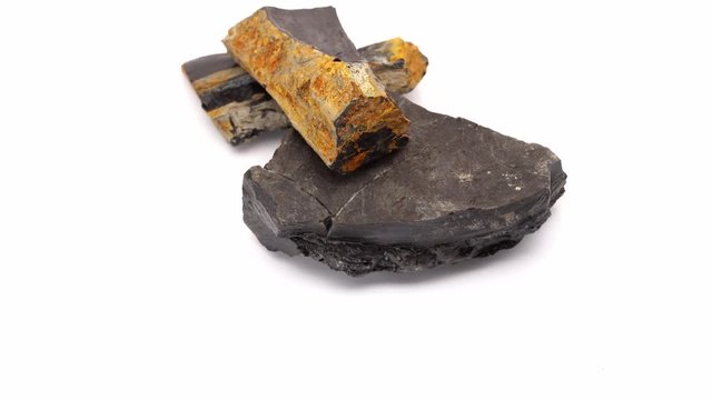 Raw Jet stone rocks spinning. Gemstone used for jewelry