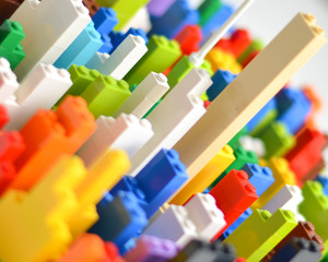 Multicolor plastic buildig blocks and bricks for kids learning. 
