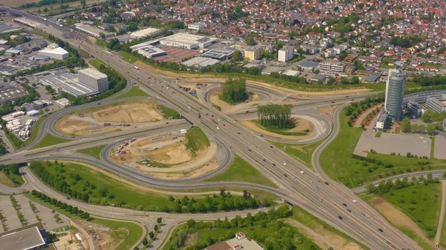 Aerial of Autobahn, Freeway cross roads close to Neckarsulm, slow tilt down with zoom in.