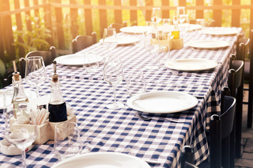 Table is set and waiting for dining in the countryside