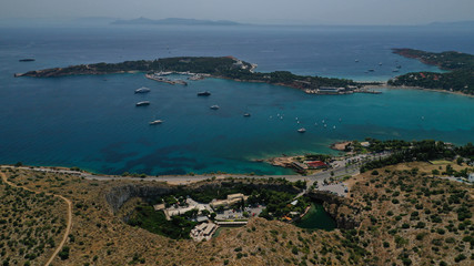 Aerial view of iconic emerald sandy celebrity beach of Asteras or Astir, Vouliagmeni, Athens...