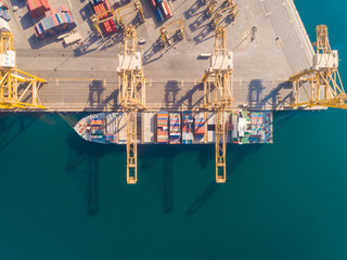 Aerial view of a boat being loaded with containers, Dubai, U.A.E.