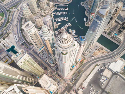 Aerial view of towers surrounding harbour in Dubai Marina, U.A.E.