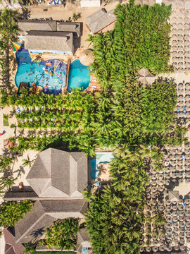 FORTALEZA, BRAZIL - 29 July 2016 : Aerial view of people swimming in swimming pool close to the beach in Brazil.