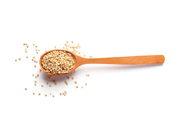 White quinoa in a wooden spoon isolated on white background