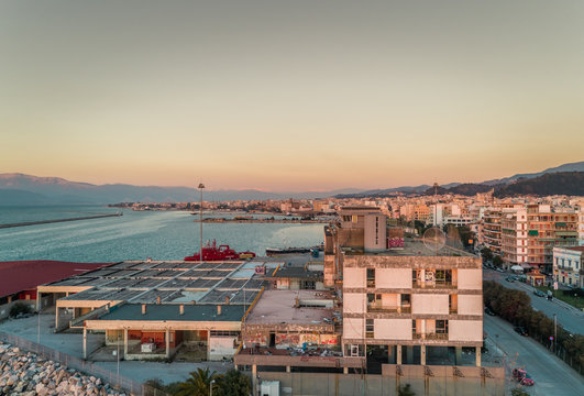 Aerial view of beautiful sunset at harbor in Patras, Greece