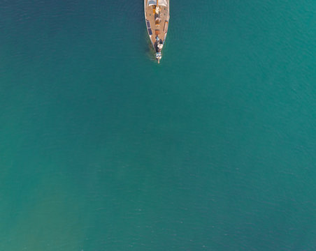 Aerial view of bow of luxury yacht in the mediterranean sea, Kefkada, Greece. - Powered by Adobe