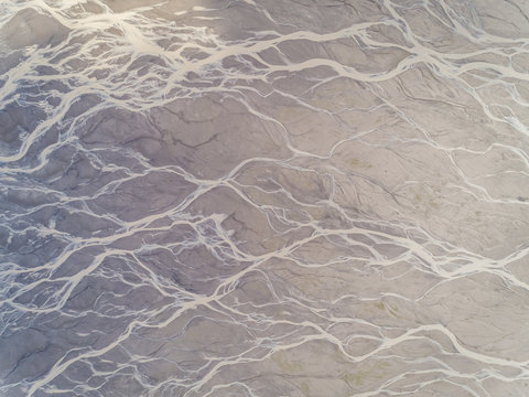 Aerial view of river creating an abstract pattern
