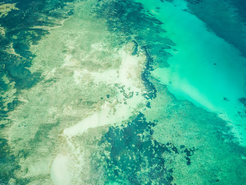 Aerial view of the paradisiac blue sea on Mafia Island, Tanzania.