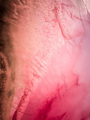 Aerial view of pink salty lake in Yallabatharra, Australia.