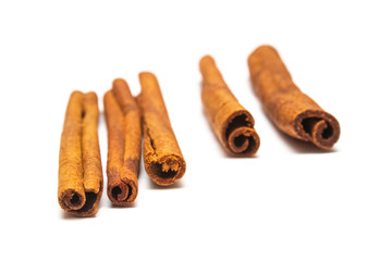 cinnamon sticks on a white background, candiedness, isolate for designers