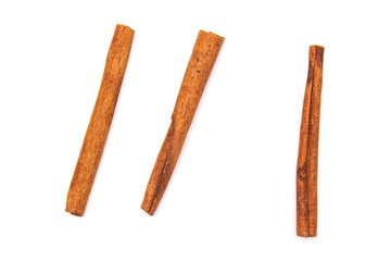 cinnamon sticks on a white background, candiedness, isolate for designers