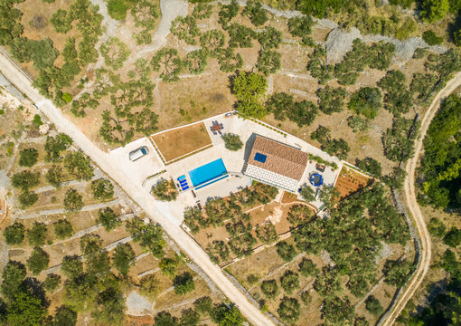 Aerial view of villa with swimming pool in Sumartin, Brac island, Croatia.