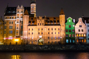 Gdansk, Poland - February 07, 2019: View of Gdansk's Main Town from the Motlawa River at night. Gdansk, Poland