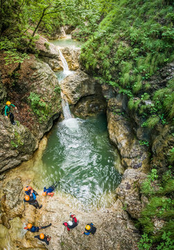 Aerial view of group canyoning.