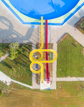 Abstract aerial view of water slide in abandoned water park.