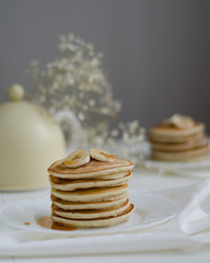 Pancakes with bananas and honey.