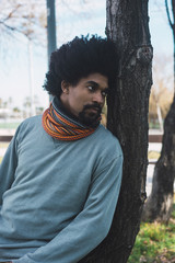 Portrait of black man with afro hair and with vintage style clothes