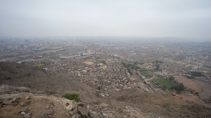 Aerial panorama of the poor districts of Lima in Peru.