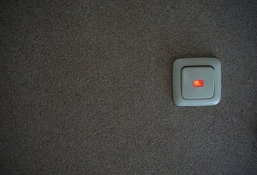 Light switch. light switch on the wall. a dark room. concept. on off.