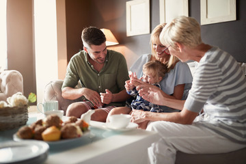 Grandmother having fun with granddaughter