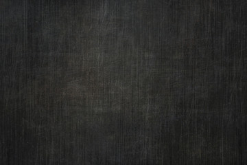 Brushed dark metal texture.