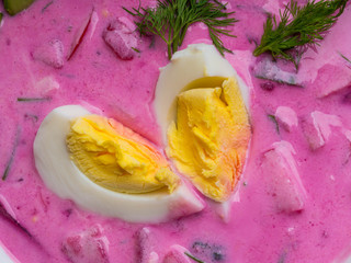 Cold beet soup with egg - traditional Belorussian, Latvian, Lithuanian, Polish, Russian and Ukrainian soup made with chard or beetroot, cucumber, radishes, sour cream, soured milk or yogurt.
