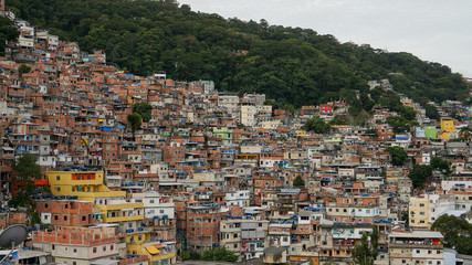 Fototapeta premium Rocinha is the largest favela in Brazil, located in Rio de Janeiro's South Zone between the districts of São Conrado and Gávea. 