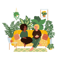 A pair of girls sitting on the couch. Multinational couple. Vector illustration in flat style isolated on white background.