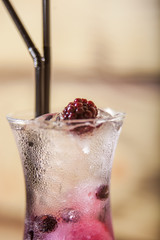 transparent cocktail in glass