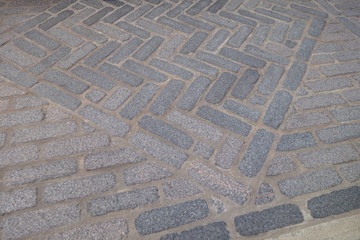 outdoor floor made of stone bricks and cement