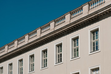 Fototapeta na wymiar real estate concept, perspective of building facade and blue sky