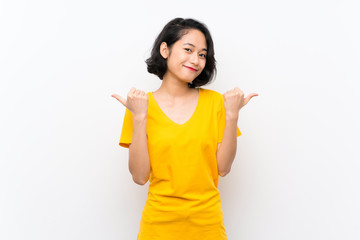 Asian young woman over isolated white background with thumbs up gesture and smiling