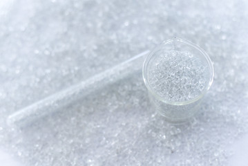 Pet polyester chips,Plastic pet polyester chips,Chips bright in beaker glass&test tube.Chemical concept